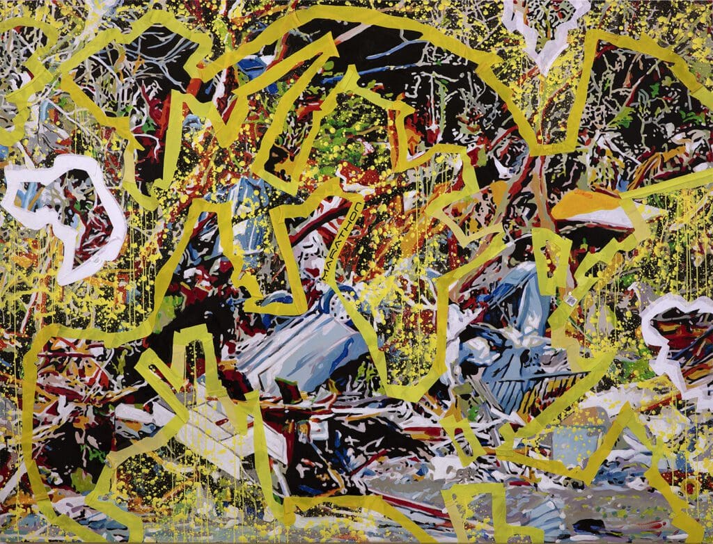 A painting of yellow graffiti on the ground.